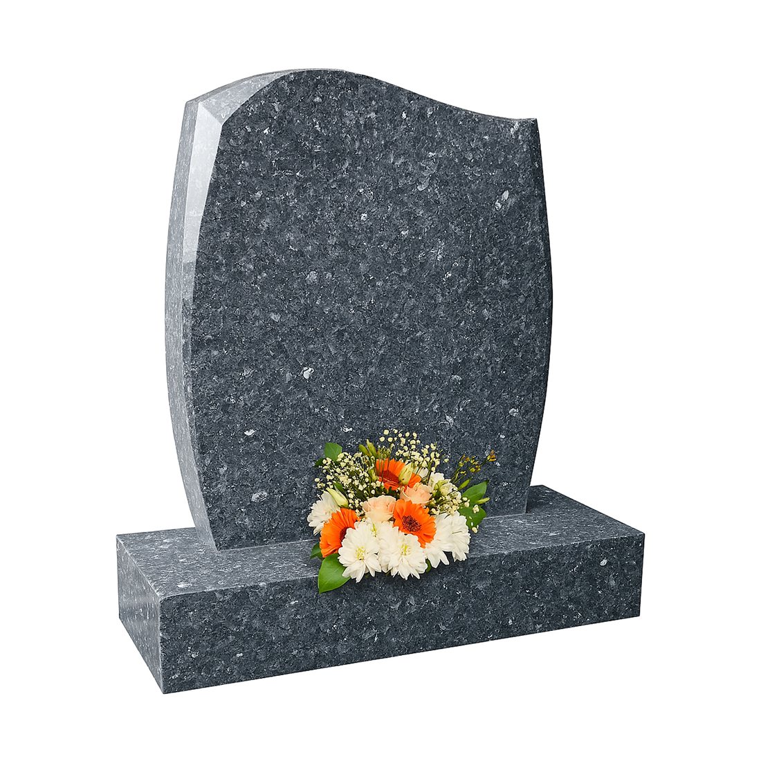 Blue-grey headstone with curved sides and flowers at its base
