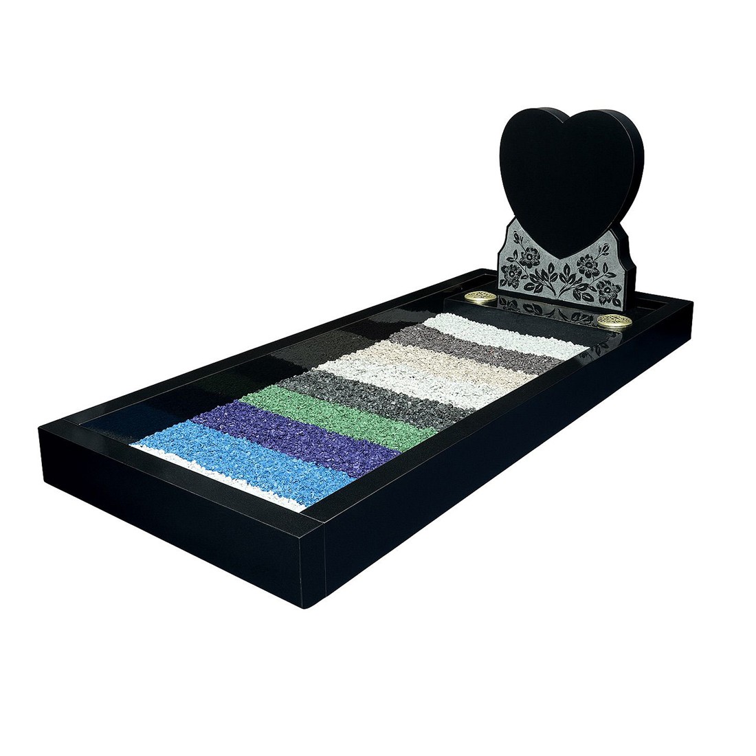 A heart-shaped headstone with a surround featuring bands of coloured chippings.