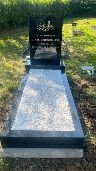 Dark memorial with a light full cover